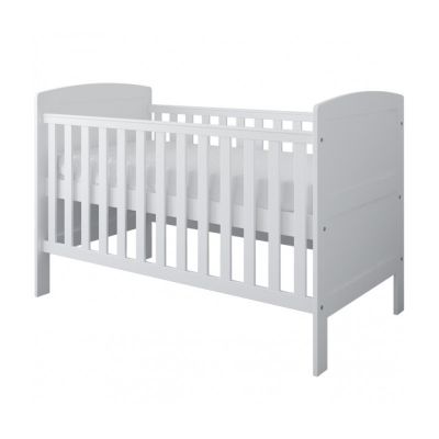 Patut din lemn Nichiduta Philip Alb 140x70cm cu Laterala detasabila,Sertar cu roti,Margine din silicon pentru protectie dintisori,Vopsele si materiale sigure,3 Nivele reglare somiera,Margini rotunjite,Sistem 2 bare detasabil